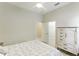 Well-lit bedroom with a full bed and access to a walk-in closet at 4015 Celestial Blue Ct, Bradenton, FL 34211