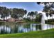Community entrance sign with landscaping and fountain at 5092 Mahogany Run Ave, Sarasota, FL 34241