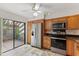 Stainless steel appliances and light wood cabinets in kitchen at 4573 Kingsmere # 27, Sarasota, FL 34235