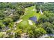 Aerial view of a lush green golf course at 4573 Kingsmere # 27, Sarasota, FL 34235