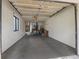 Attached garage with ample space for storage and workbench at 4573 Kingsmere # 27, Sarasota, FL 34235