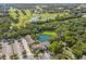 Aerial view of community building and golf course at 4573 Kingsmere # 27, Sarasota, FL 34235