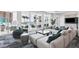 Relaxing lounge area with sectional sofa and pool view at 301 Quay Commons # 1209, Sarasota, FL 34236