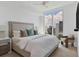 King-size bedroom with city views and plenty of natural light at 301 Quay Commons # 1209, Sarasota, FL 34236