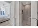 Bathroom with walk-in shower and access to the bedroom at 301 Quay Commons # 1209, Sarasota, FL 34236