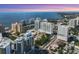 Aerial view of city skyline and waterfront property at 301 Quay Commons # 1209, Sarasota, FL 34236