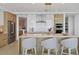 Spacious kitchen featuring a large island with seating and stainless steel appliances at 301 Quay Commons # 1209, Sarasota, FL 34236