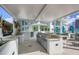 Outdoor kitchen with stainless steel grills at 301 Quay Commons # 1209, Sarasota, FL 34236