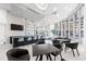 Lobby with bar and comfortable seating for residents at 301 Quay Commons # 1209, Sarasota, FL 34236