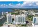 Aerial view of waterfront high-rise building and landscape at 301 Quay Commons # 1209, Sarasota, FL 34236