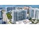 High-rise building near water, aerial view at 301 Quay Commons # 1209, Sarasota, FL 34236