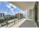Spacious balcony offering scenic city and water views at 301 Quay Commons # 1209, Sarasota, FL 34236