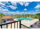 Resort-style pool with clubhouse and lounge area, overlooking a golf course at 2625 Terra Ceia Bay Blvd # 205, Palmetto, FL 34221