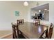 Dining area with dark wood table and kitchen pass-through at 2625 Terra Ceia Bay Blvd # 205, Palmetto, FL 34221