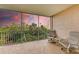 Relaxing screened balcony with outdoor seating and scenic view at 2625 Terra Ceia Bay Blvd # 205, Palmetto, FL 34221