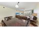 Bright dining area with wood table and chairs, adjacent to living room at 2625 Terra Ceia Bay Blvd # 205, Palmetto, FL 34221