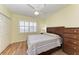Bedroom with double door closet and window shutters at 2625 Terra Ceia Bay Blvd # 205, Palmetto, FL 34221