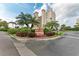 Estuaries II building entrance with landscaping and signage at 2625 Terra Ceia Bay Blvd # 205, Palmetto, FL 34221