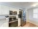 Kitchen with stainless steel appliances and granite countertops at 2625 Terra Ceia Bay Blvd # 205, Palmetto, FL 34221
