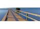 Long wooden dock extending into the water, offering great fishing opportunities at 2625 Terra Ceia Bay Blvd # 205, Palmetto, FL 34221