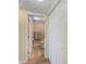 Small bathroom with toilet and access to hallway closet at 2625 Terra Ceia Bay Blvd # 205, Palmetto, FL 34221