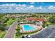 Community pool with surrounding patio and parking at 2625 Terra Ceia Bay Blvd # 205, Palmetto, FL 34221