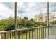 View from lanai showcasing lush landscaping and nearby buildings at 2625 Terra Ceia Bay Blvd # 205, Palmetto, FL 34221