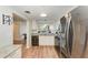 Modern kitchen with granite countertops and stainless steel appliances at 2625 Terra Ceia Bay Blvd # 205, Palmetto, FL 34221