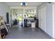 Garage with laundry area and access to backyard patio at 22119 Laramore Ave, Port Charlotte, FL 33952