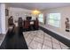 Home office with a large desk, computer, and plenty of storage at 22119 Laramore Ave, Port Charlotte, FL 33952