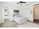 Charming bedroom with a queen-size bed and en-suite bathroom at 4833 Tobermory Way, Bradenton, FL 34211