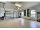 Spacious garage with ample storage and room for golf cart at 7204 Saint Georges Way, University Park, FL 34201