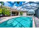 Stunning pool with spa and screened patio overlooking golf course at 7204 Saint Georges Way, University Park, FL 34201