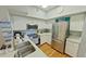 Well-equipped kitchen featuring stainless steel appliances and white cabinetry at 4160 Central Sarasota Pkwy # 613, Sarasota, FL 34238