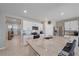 Kitchen with white cabinets, granite countertops, and stainless steel appliances at 5120 Vecchio Ct, Bradenton, FL 34211