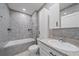 Clean bathroom with a bathtub, toilet, and updated vanity at 5120 Vecchio Ct, Bradenton, FL 34211