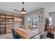 Dining area with a wooden table and access to a patio at 5120 Vecchio Ct, Bradenton, FL 34211