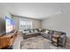 Relaxing living room with sectional sofa and large window at 5120 Vecchio Ct, Bradenton, FL 34211