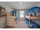 ' bedroom with built-in bunk beds and playful decor at 5120 Vecchio Ct, Bradenton, FL 34211