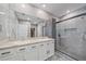 Elegant bathroom with double sinks, a large shower, and modern fixtures at 5120 Vecchio Ct, Bradenton, FL 34211