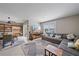 Spacious living room with a large sectional sofa and TV at 5120 Vecchio Ct, Bradenton, FL 34211