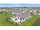 Aerial view of home with backyard patio and fenced yard at 5120 Vecchio Ct, Bradenton, FL 34211