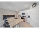 White shaker cabinets, granite countertops and kitchen island at 5120 Vecchio Ct, Bradenton, FL 34211
