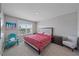 Bright bedroom with a king-size bed and lake view at 5120 Vecchio Ct, Bradenton, FL 34211