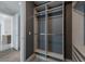 Walk-in closet with shelves and hanging rods at 111 S Pineapple Ave # 1021, Sarasota, FL 34236