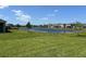 Expansive backyard with pond views at 11709 Capstan Pl, Parrish, FL 34219