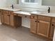 Dual sink bathroom vanity with cabinets, drawers, and a makeup area for enhanced functionality at 11718 Capstan Pl, Parrish, FL 34219