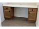 Built-in office nook with storage drawers, cabinets, and a white countertop, seamlessly blending functionality and style at 11718 Capstan Pl, Parrish, FL 34219