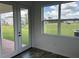 Enclosed lanai with a great view of the fenced in backyard at 11722 Capstan Pl, Parrish, FL 34219