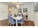Bright dining room offers a chandelier, decorative furnishings, and modern decor at 7572 Viola Loop, Lakewood Ranch, FL 34202